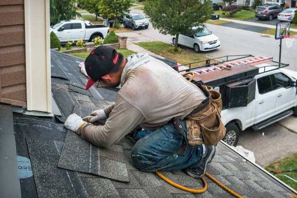 Professional Roofing technician working in Lake Grove, NY